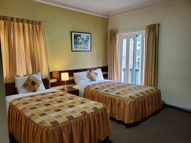 Posada The Place Hostal