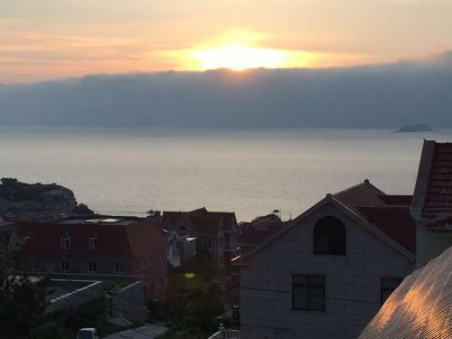 Qingdao Xiufengge Inn