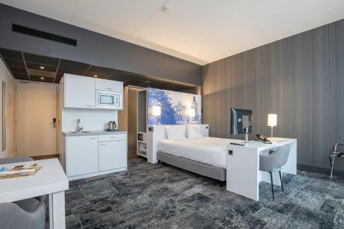 Hampshire Hotel - Fitland Oss