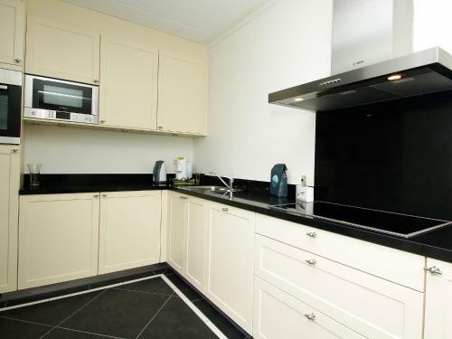Hotel Holiday Home 6p. Wellnesswoning