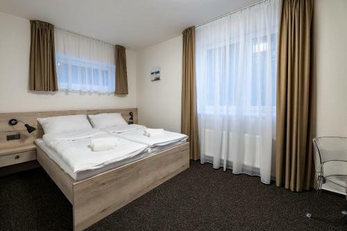 Hostal Penzion Dionysos Pod Kartouzkou