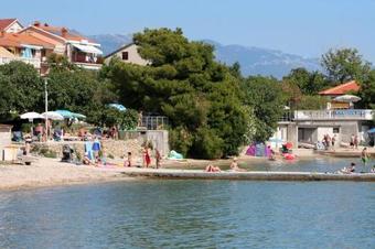 Family Friendly Apartments With A Swimming Pool Mundanije (rab) - 5075