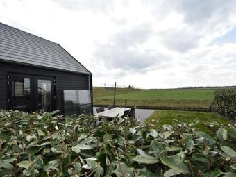 Modern Holiday Home Kattendijke By The Lake