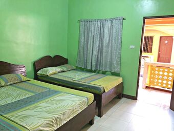 Hotel Queen Of Isle Restaurant And Cottages