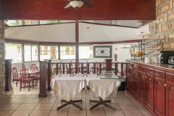 Capital O Palms Hotel