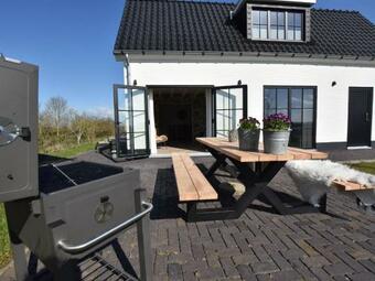 Serene Holiday Home In Nieuwvliet With Garden