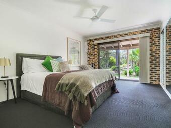 Big Backyard With Outdoor Spa And Luxury Furnishings