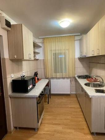 Apartamento Garsonier? �n Regim Hotelier