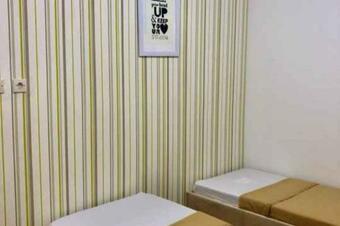 Hotel Banana Home Stay Syariah Redpartner