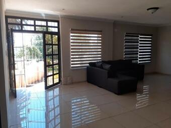 Hostal Palm Gardens Guesthouse