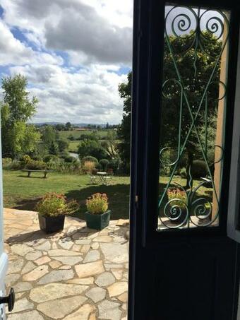 Maison Rouge Adossee A La Colline Et Son Etang