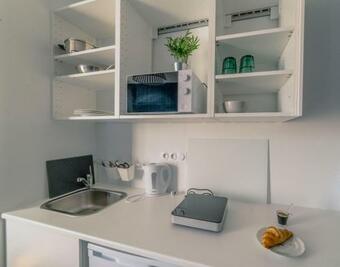 Apartamento Apparth�tel, Grande Chambre Cot� Jardin, Coeur De Village