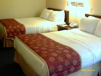 Merit Hotel & Suites