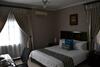 Triple Palms Bed And Breakfast